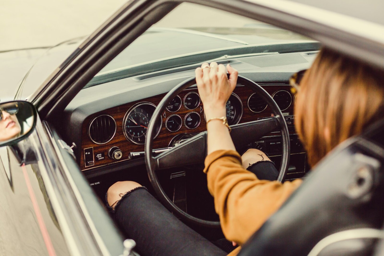 person sitting in the driver seat