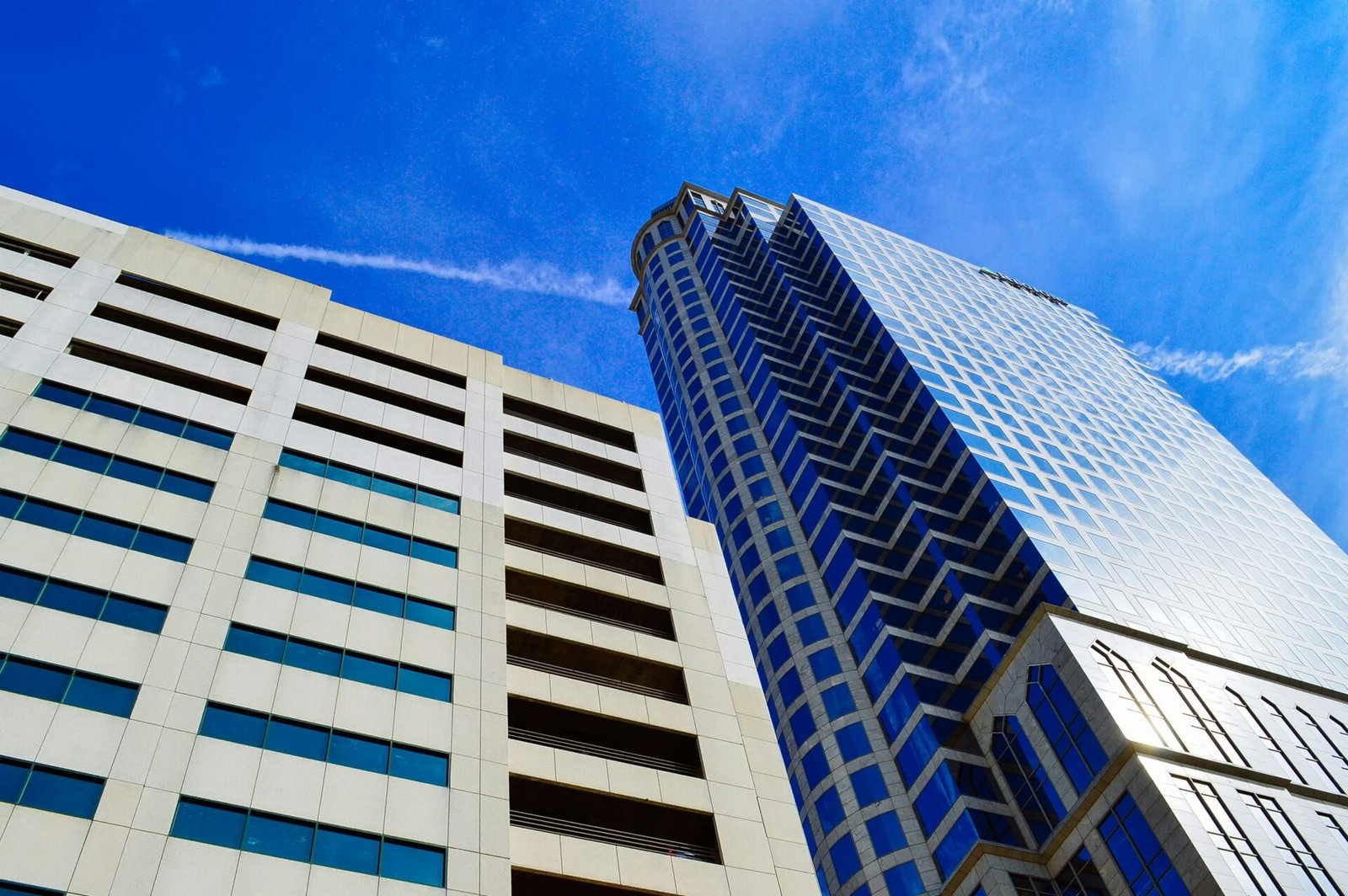 white and blue concrete building under blue sky during daytime